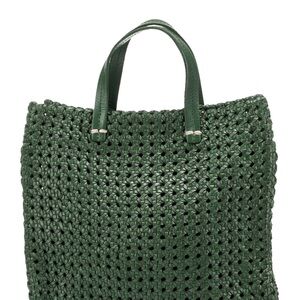 Clare V 
Green woven bag.